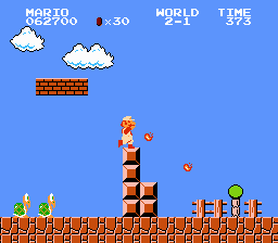 Super Mario Bros. (NES) screenshot: Fiery Mario tosses a few fireballs.