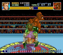 Super Punch-Out!! (SNES) screenshot: Piston Hurricane's jaw may never be the same