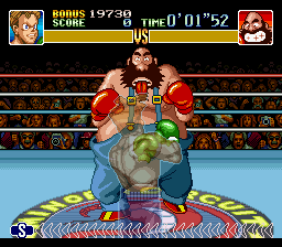 Super Punch-Out!! (SNES) screenshot: Hitting Bear Hugger in the stomach may not be a good idea