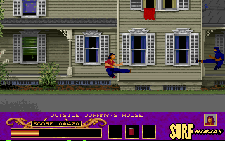 Surf Ninjas (DOS) screenshot: Still level one, Johnny does a flying kick.