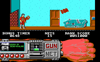 Techno Cop (DOS) screenshot: Prowling a dilapidated apartment complex in search of the perp (EGA)