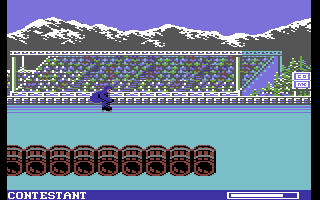 World Games (Commodore 64) screenshot: Barrel Jumping - make sure to time your jump well...