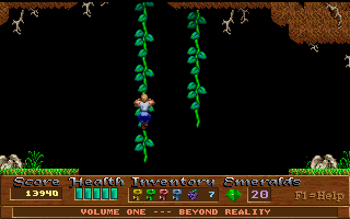 Xargon (DOS) screenshot: Swinging from vines to reach better areas.