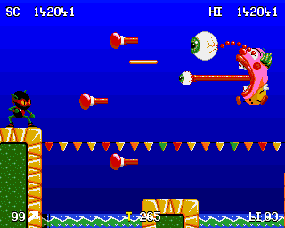 Zool (Amiga) screenshot: Fairground World Boss - The unmentionable, indescribable Two Eyed Thing