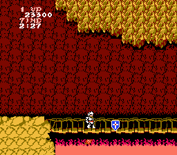 Ghosts 'N Goblins (NES) screenshot: The bridge across lava; there is a powerful cross weapon here