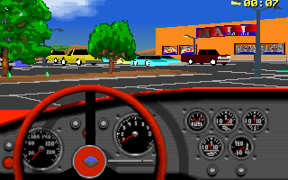 Car and Driver (DOS) screenshot: At the San Dimas mall parking lot.