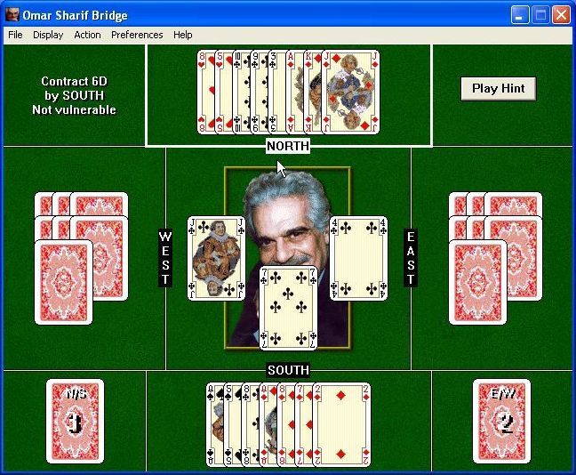 Omar Sharif Bridge (Windows) screenshot: A game in progress, this is the trick taking stage