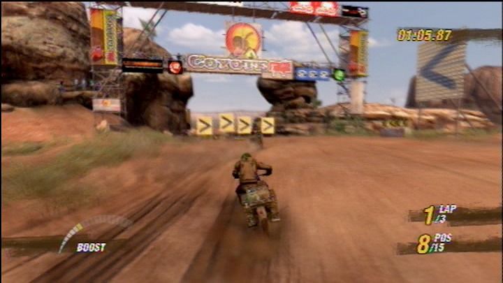 MotorStorm (PlayStation 3) screenshot: One lap down, two more to go