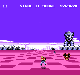 Space Harrier (NES) screenshot: On the later stages the robots appear