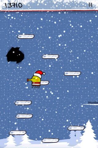 Doodle Jump (iPhone) screenshot: Don't jump into the hole or it's game over already.
