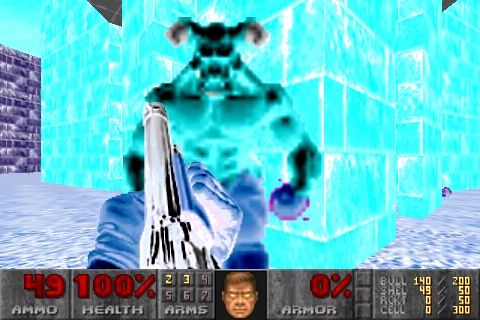 The Ultimate Doom (iPhone) screenshot: Fighting a hellknight in god mode.