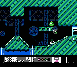 Mr. Gimmick (NES) screenshot: Pushing the cannon ball launcher off the edge, let's see the balls roll uphill!