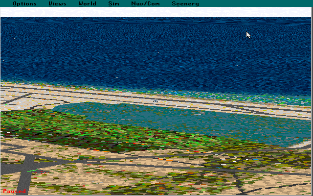 Microsoft Hawaii: Scenery Enhancement for Microsoft Flight Simulator (DOS) screenshot: Flying over the Honolulu area and looking out to seas with the scenery pack installed. Honolulu airport now has more runways