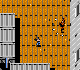 Ikari III: The Rescue (NES) screenshot: This mid-level boss throws shuriken.