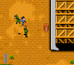 Ikari III: The Rescue (NES) screenshot: Yes, those barrels do explode.