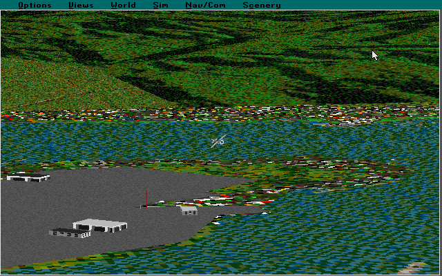 Microsoft Hawaii: Scenery Enhancement for Microsoft Flight Simulator (DOS) screenshot: Flying over the Honolulu area with the scenery pack installed. There are now buildings on the airport