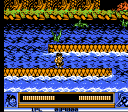 Joe & Mac: Caveman Ninja (NES) screenshot: Running along the river.