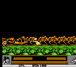Joe & Mac: Caveman Ninja (NES) screenshot: Another Krayt dragon?