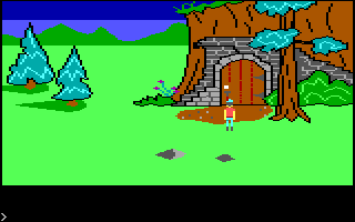 King's Quest (PC Booter) screenshot: A door in the side of the mountain. (Original PCjr release)