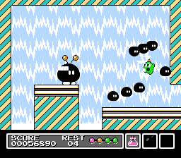 Mr. Gimmick (NES) screenshot: The boss's spew of enemies proves no match for Mr. Gimmick!