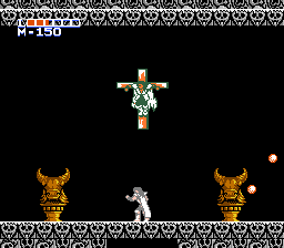 Holy Diver (NES) screenshot: Wow, this is disturbing! The boss in this level is nearly impossible to kill.