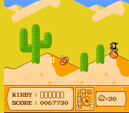 Kirby's Adventure (NES) screenshot: The Wheel bonus turns you into a wheel and you can rip through levels and enemies alike.
