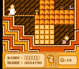 Kirby's Adventure (NES) screenshot: The hammer is good for bashing through obstacles quickly.