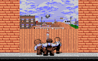 The Three Stooges (Apple IIgs) screenshot: Moe pushes aside Larry and Curly to get a peek in the fence.