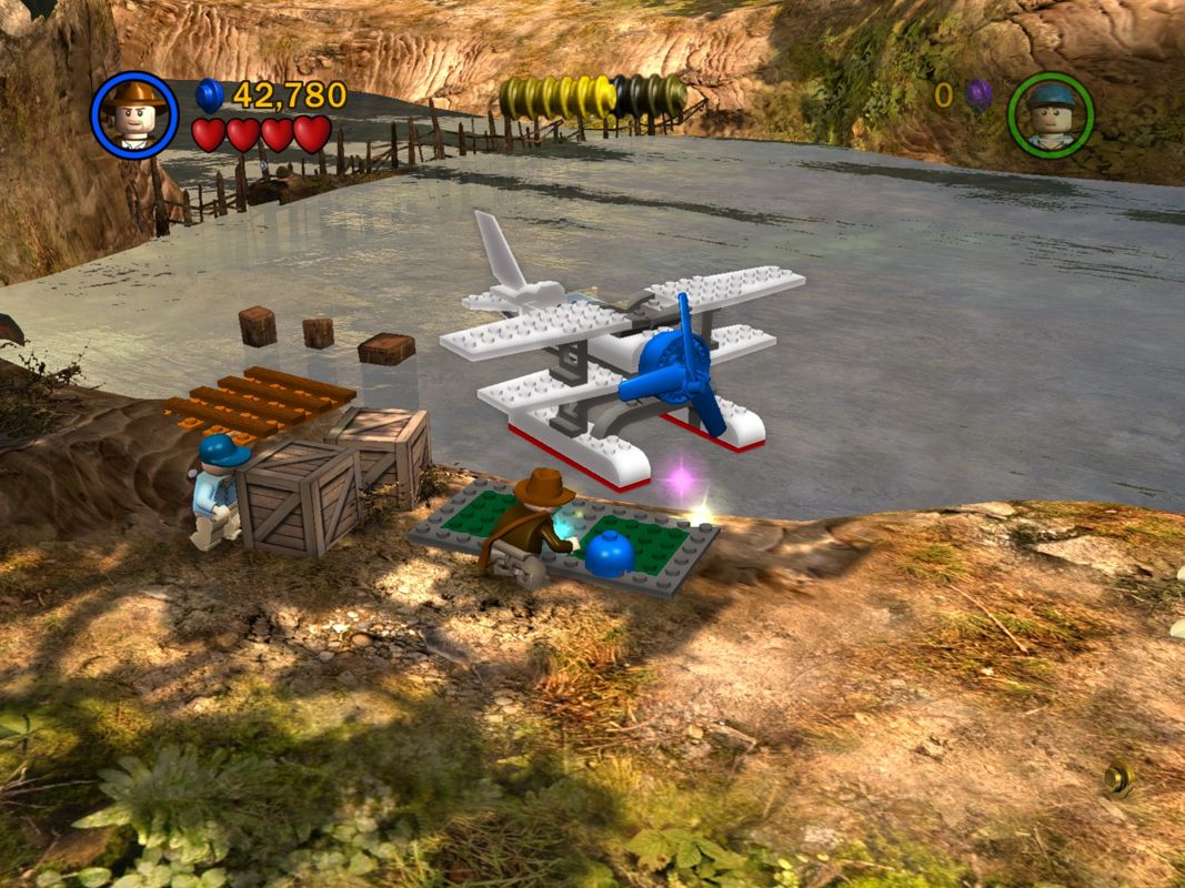 LEGO Indiana Jones: The Original Adventures (Windows) screenshot: Reparing the air plane.