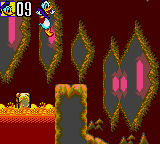 Deep Duck Trouble starring Donald Duck (Game Gear) screenshot: Moving platforms on the lava.