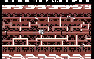 Scorpion (Commodore 64) screenshot: Level 1 - Pick up all bombs as you move along the network of pipes