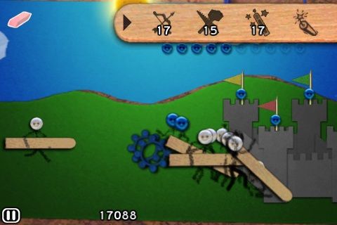 Defend Your Castle (iPhone) screenshot: I've 17 archers and sorcerers and 15 workers, repairing the castle.
