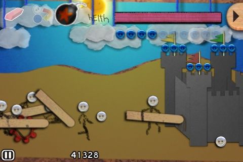 Defend Your Castle (iPhone) screenshot: Now I've access to the third and final spell: a bomb.
