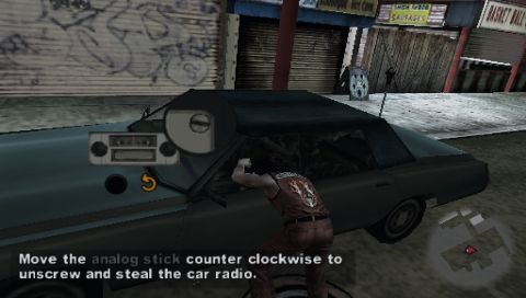 The Warriors (PSP) screenshot: To steal a car radio you need to move the analog stick clockwise to unscrew it.