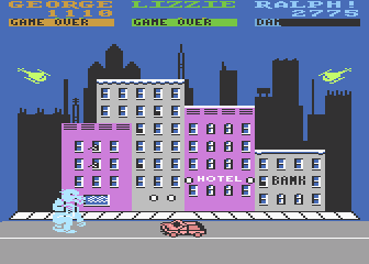 Rampage (Atari 8-bit) screenshot: What a cute pink buildings in this city