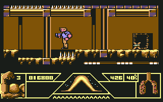 Total Recall (Commodore 64) screenshot: Quaid standing on some spikes