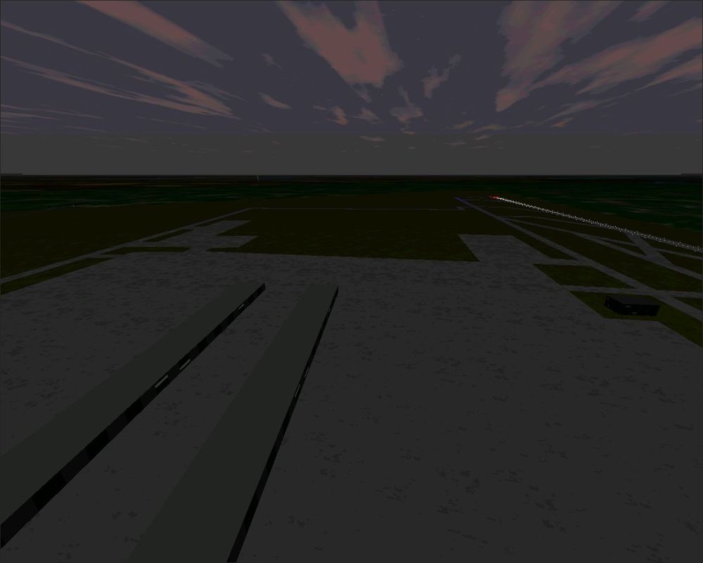 Airport 2000: Volume 1 (Windows) screenshot: The Charles De Gaulle airport by night using the Charles De Gaulle airport by night using the default scenery