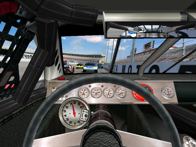 NASCAR Racing 2002 Season (Windows) screenshot: Cockpit view.