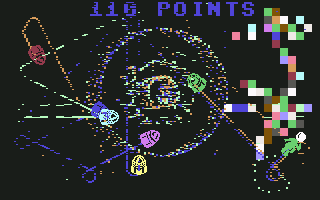 Moondust (Commodore 64) screenshot: Some seed squares remain in the inner circle: points are scored.