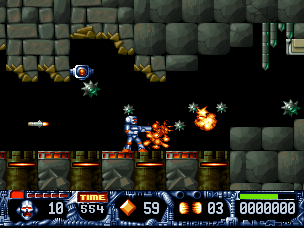 Turrican II: The Final Fight (DOS) screenshot: These spiked balls decompose into smaller copies of themselves