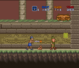 Inspector Gadget (SNES) screenshot: If Gadget gets hit, he will lose his overcoat