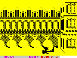 Sports-A-Roni (ZX Spectrum) screenshot: Run up the wall : Timing the jump is critical or else the character runs into the wall, and ends up like this.