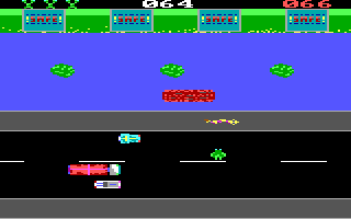 Toad Road (DOS) screenshot: Round two takes away a car, but adds a snake on the riverbank