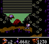 Earthworm Jim (Game Gear) screenshot: Junk on conveyor