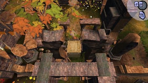 Frantix (PSP) screenshot: Kaz pushing crate at House of Hazards level.