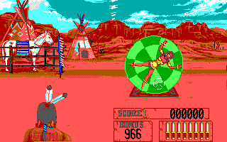 Buffalo Bill's Wild West Show (DOS) screenshot: Knife throwing - Don't hit the woman or we'll have an embarrassing lawsuit on our hands!