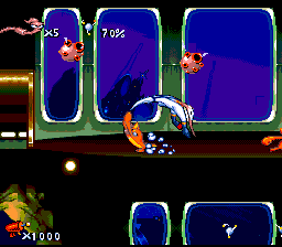 Earthworm Jim (SNES) screenshot: What the fish do to poor Jim is beyond comprehension