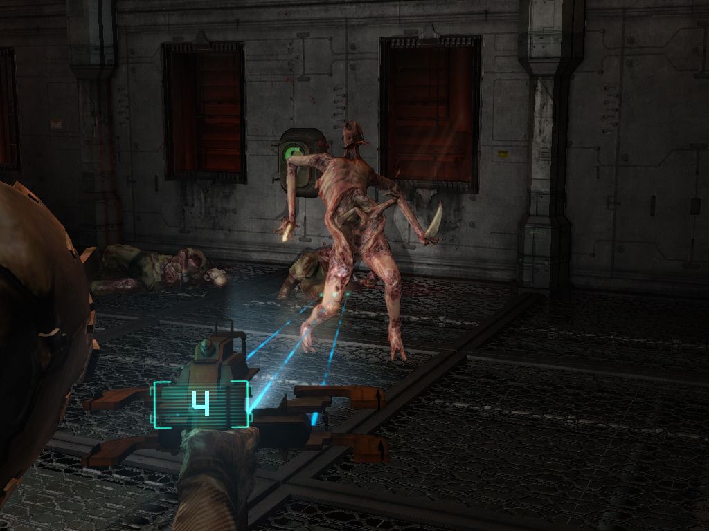 Dead Space (Windows) screenshot: Most of the crew on the Ishimura has turned into "necromorphs". They can fight even without their heads, so aim for their arms and legs instead.