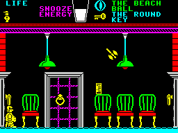 Pyjamarama (ZX Spectrum) screenshot: Its not enough to have a flying axe. This axe bounces around the screen like a rubber ball. Unfortunately when one ax exits on the right another comes through the door on the left..