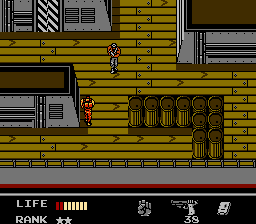 Snake's Revenge (NES) screenshot: ...and finds himself on a cargo ship...